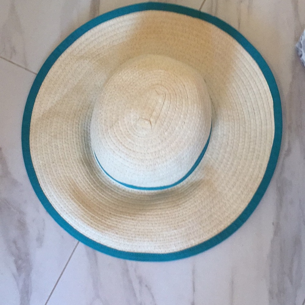 I am selling a tan and blue hat